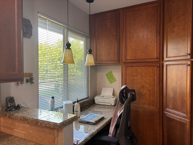 Building Photo - Welcome to this stunning updated 2-bedroom, 2-bathroom home on a lake located in the vibrant comm...