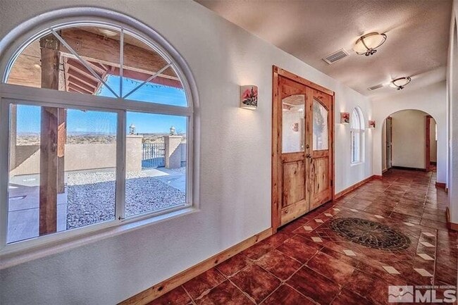 Building Photo - Spacious Lake-Adjacent Estate on 4.6 Acres in Silver Springs, NV