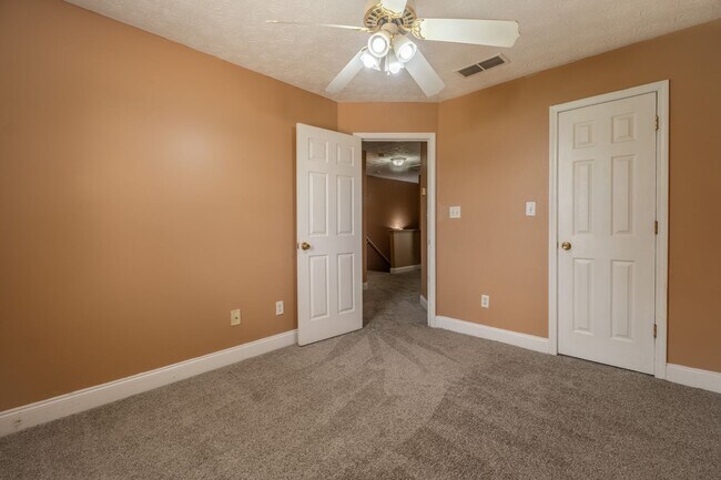 Building Photo - Spacious 4BR/3BA Townhome | Pet Friendly | Washer & Dryer Included | $1,600/mo