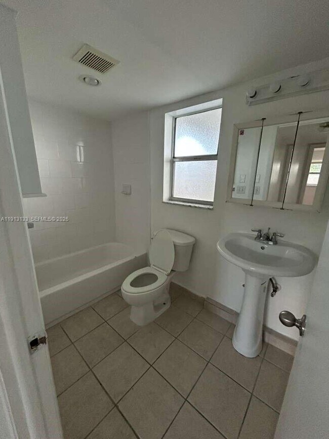 Building Photo - 8460 Sunrise Lakes Blvd