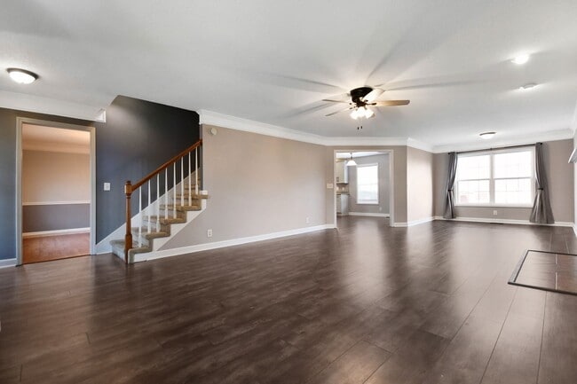 Building Photo - Pet Friendly Three Bedroom with Bonus!