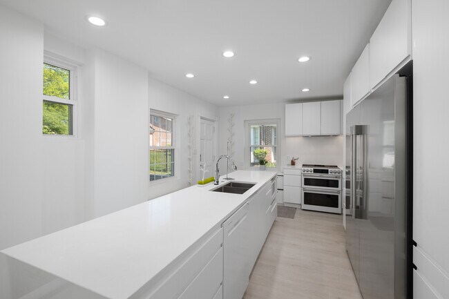 Large kitchen with 11 foot long island. - 31 Dartford Ave