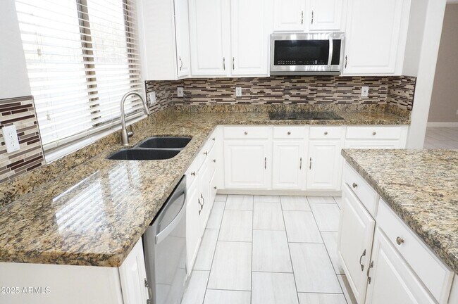 Building Photo - 6700 S Agate Way