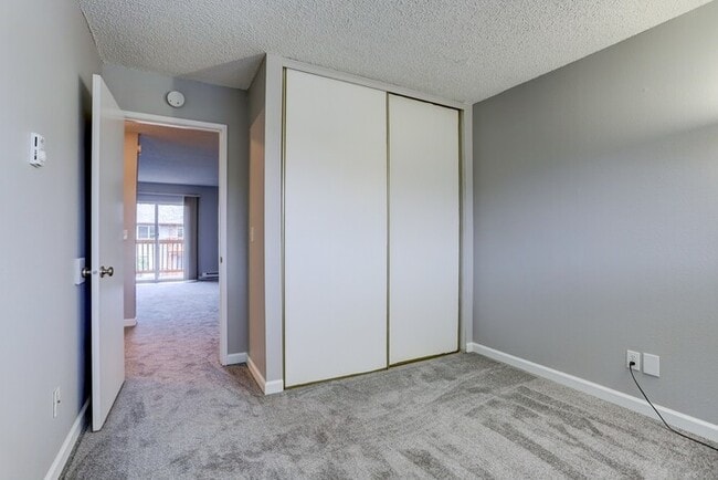 Building Photo - First Month Rent Special! Bright Upper 2-Bedroom with Balcony