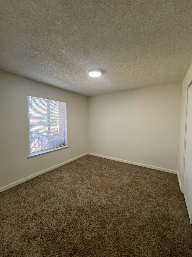 Building Photo - Upstairs unit Available Soon!