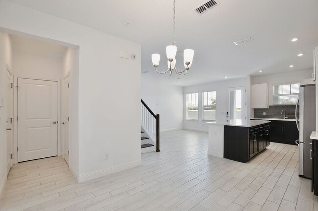 Building Photo - Stunning 3/2.5 Modern Townhome with a Priv...