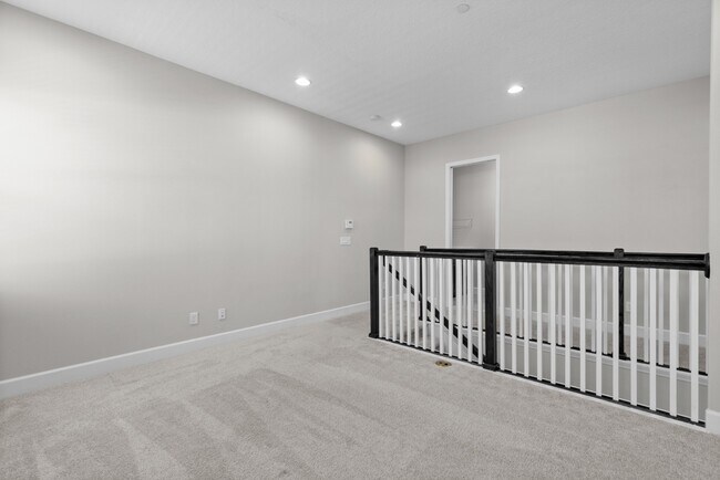 Building Photo - Move In Ready End Unit Townhome in Laureate Park | 3 Bed | Tesla Charger