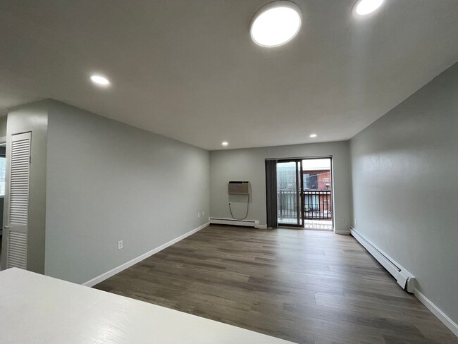 Building Photo - Renovated 2-Bedroom Condo with Balcony, Po...