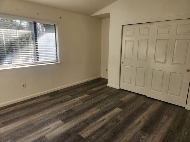 Building Photo - A Must See! Nice and bright, lots of light, two story condo in a well maintained complex.