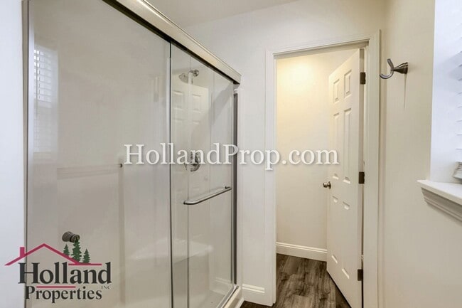 Building Photo - Charming 3-Bedroom Home with Wood Floors, Gas Fireplace & Private Patio