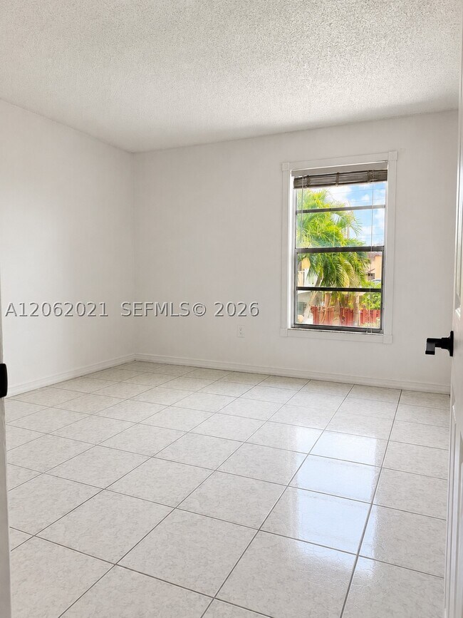 Building Photo - 6095 W 18th Ave