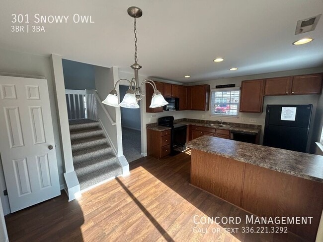 Building Photo - 301 Snowy Owl Ct