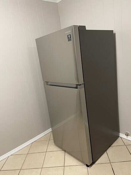 New stainless fridge - 1185 N Double Springs Rd