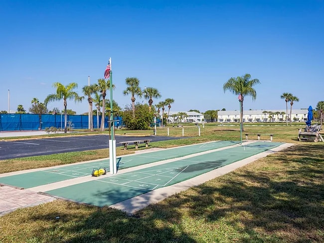 Building Photo - Stunning 2/1 available now at Waterside at Coqunia Key!