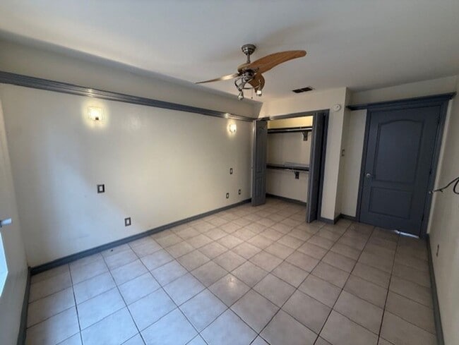 Building Photo - Downstairs -Three-bedroom Condo