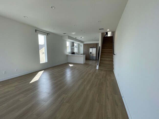 Building Photo - JUST COMPLETED MODERN TOWNHOMES! Never Liv...