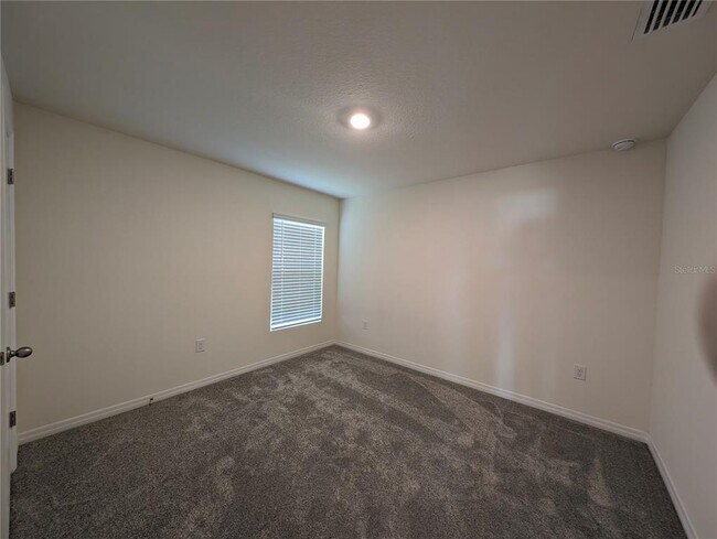 Building Photo - 8661 Triumph Cir