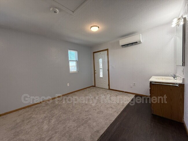 Building Photo - 1149 E 58th Ave