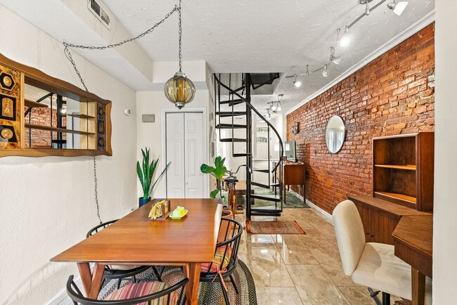 Building Photo - Charming Row Home | 2 Bed | 1 Bath | 950 Sf | Fenced Backyard | 2 Surface Parking Spaces