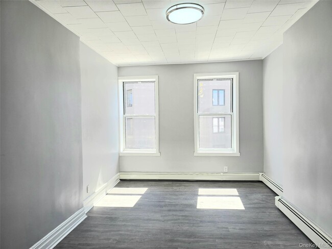 Building Photo - 56-46 Myrtle Ave