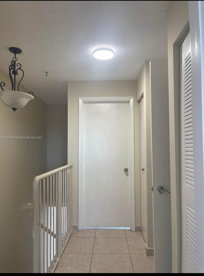 Building Photo - 7935 W 30th Ct
