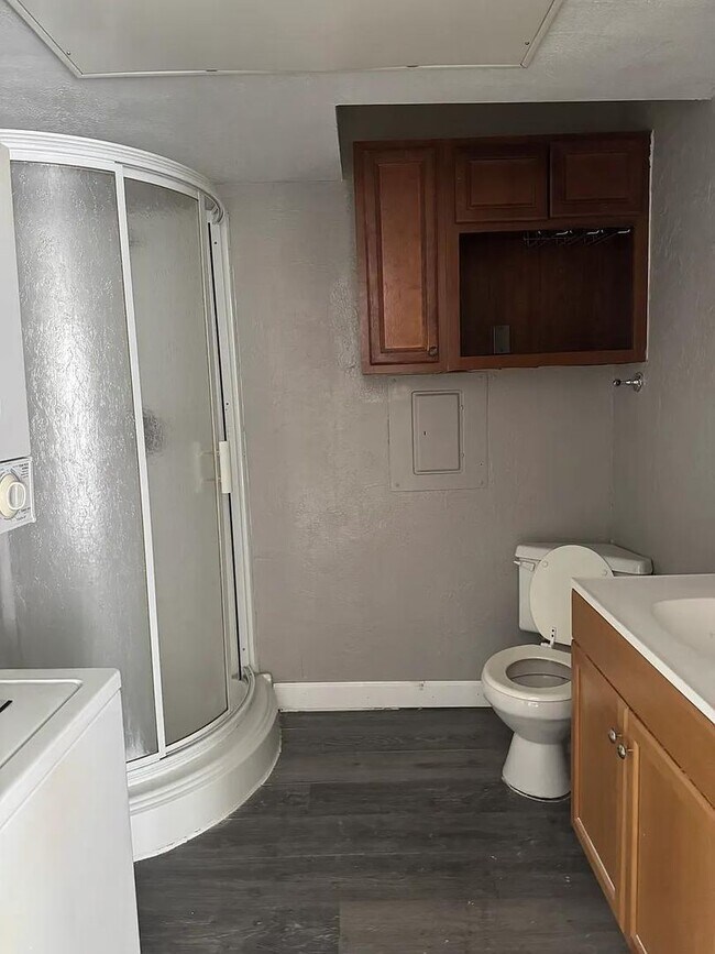 Building Photo - Affordable studio condo with shower-only bath, open layout, and convenient location  perfect for ...