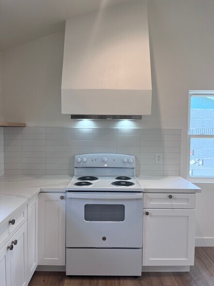 New electric stove - 8144 Washington Ave