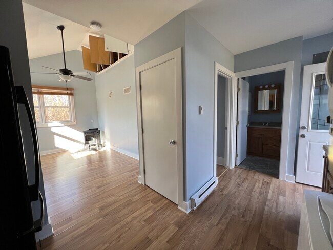 Open cabinet storage above living room - 2221 Middleton Beach Rd