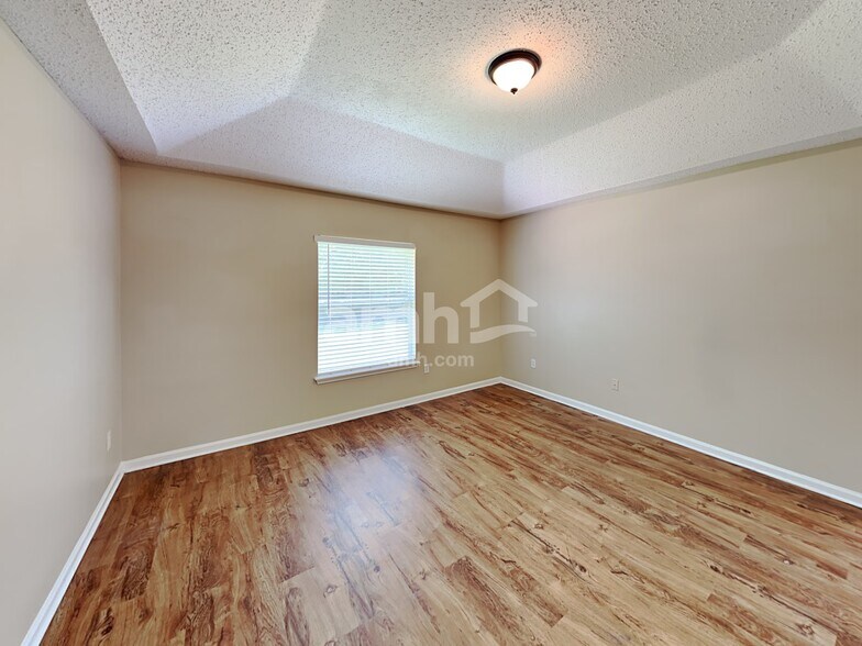 Building Photo - 6815 Rapid River Dr