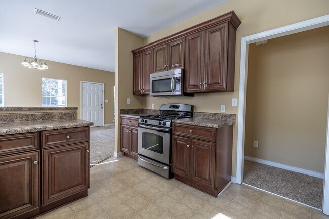 Building Photo - Now Available in Spanish Fort – Churchill Downs Community!