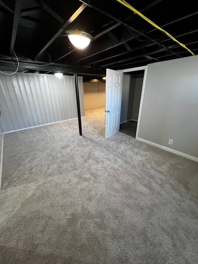Basement main living area - 8313 Smithton Rd