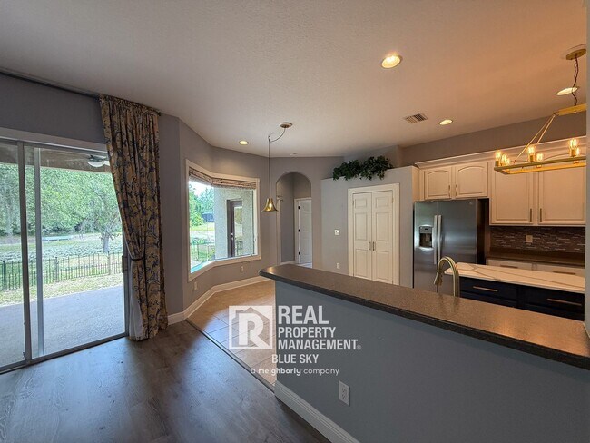 Building Photo - Executive Home with Custom Finishes in Gat...