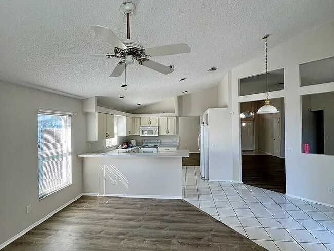 Building Photo - Freshly painted exterior and neutral color interior.
