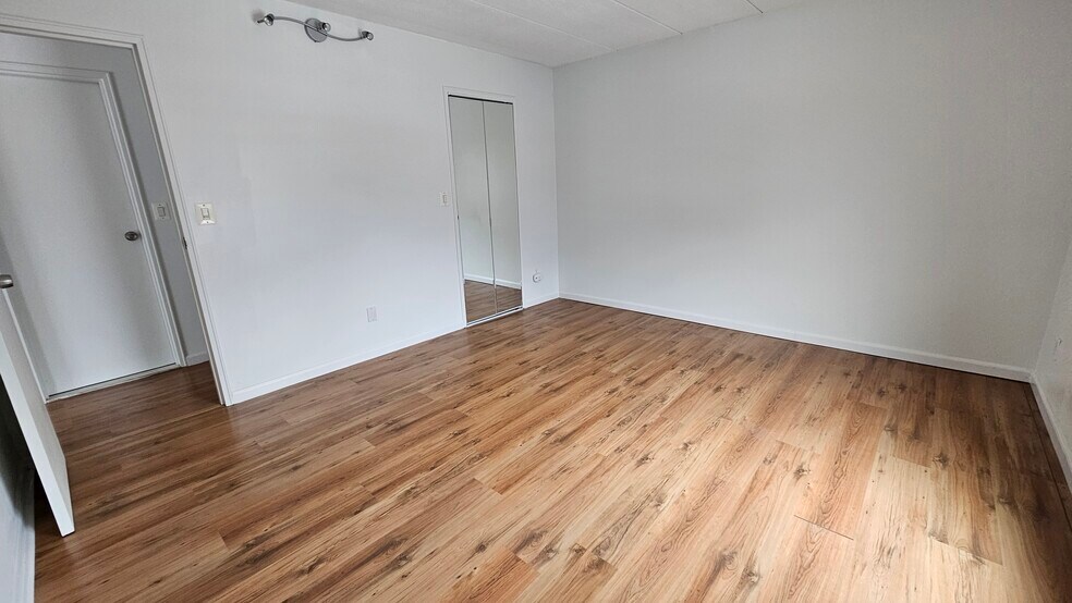 Bedroom with a walk in closet - 147 Turner Rd