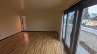 Building Photo - Bright Upstairs Studio with Deck & Peek of the Ocean | Utilities Included