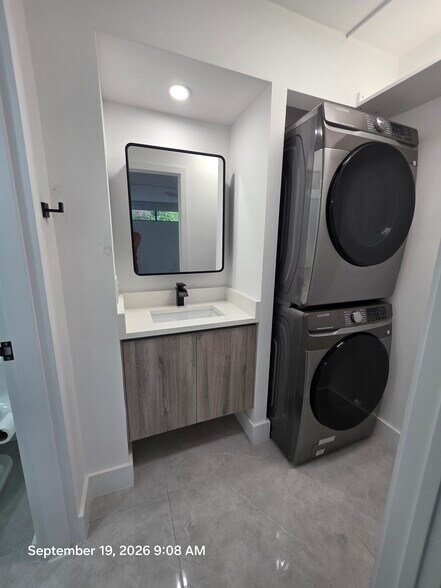 Master bathroom and laundry - 6446 Miami Lakes Dr