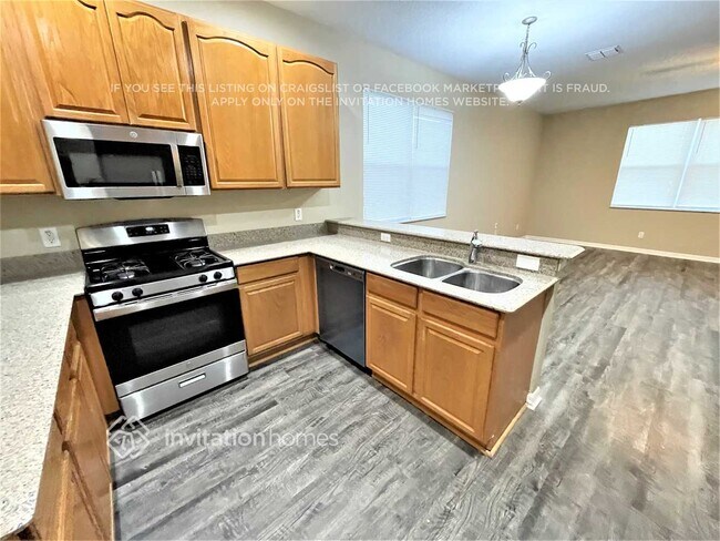 Building Photo - 9464 Leatherwood Ave