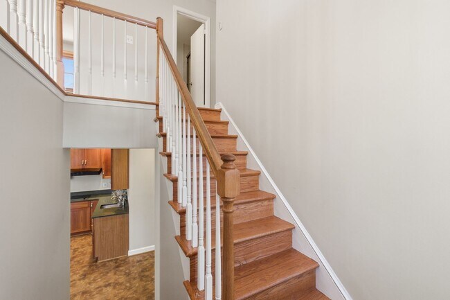Building Photo - 5BR / 3BA Home with Flexible Living Space & Tree-Lined Views