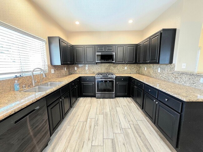Building Photo - Three-bedroom Single Family