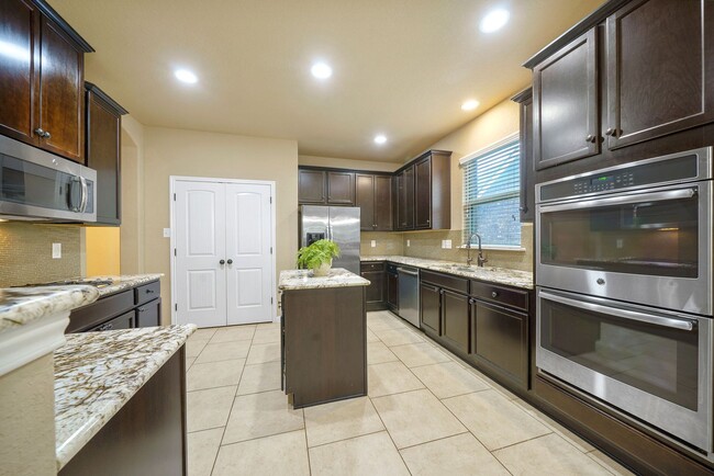 Building Photo - Executive-Style Home Now Available in Alam...