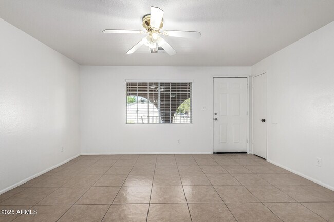 Building Photo - 8107 W College Dr