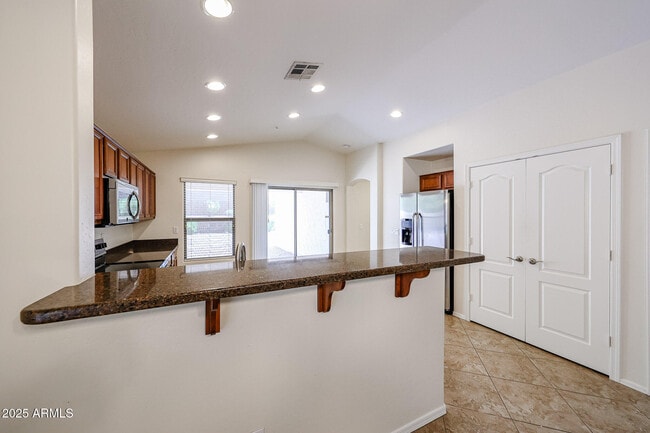 Building Photo - 12848 W Desert Mirage Dr