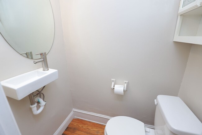 Building Photo - Charming 4-Bedroom Home with Hardwood Floo...