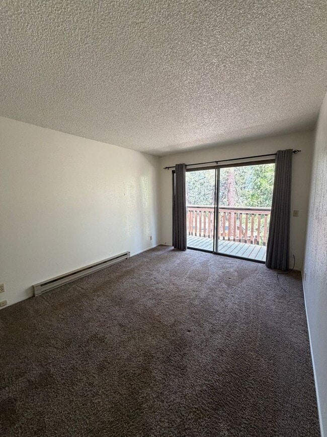 Building Photo - Spacious 2 Bed, 1.5 Bath Condo w/Carport - Outdoor Pool in Summer (Long Term Rental)