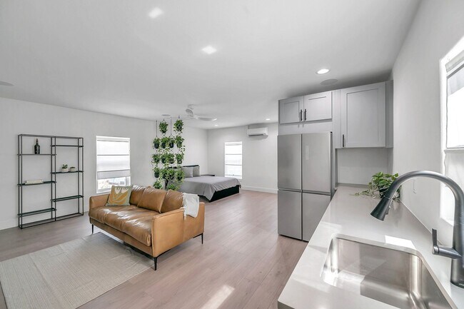 Building Photo - Luxury Living in Grand Central District: Exquisite Furnished Home with Pool