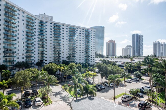 Building Photo - 19390 Collins Ave