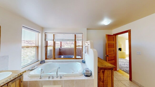 Building Photo - Custom Adobe style home in exclusive Navaj...