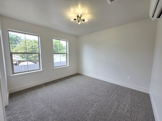 Building Photo - END UNIT- Now Leasing! Brand-New 3 Bed, 2....