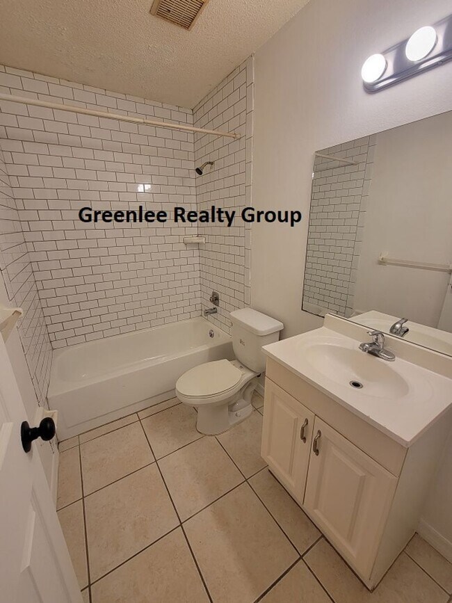 Building Photo - Relax by the water in this spacious 2-bedroom home with a 2-car garage, nestled in the highly des...