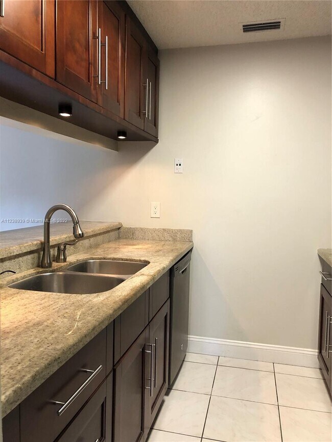 Building Photo - 3799 Cocoplum Cir